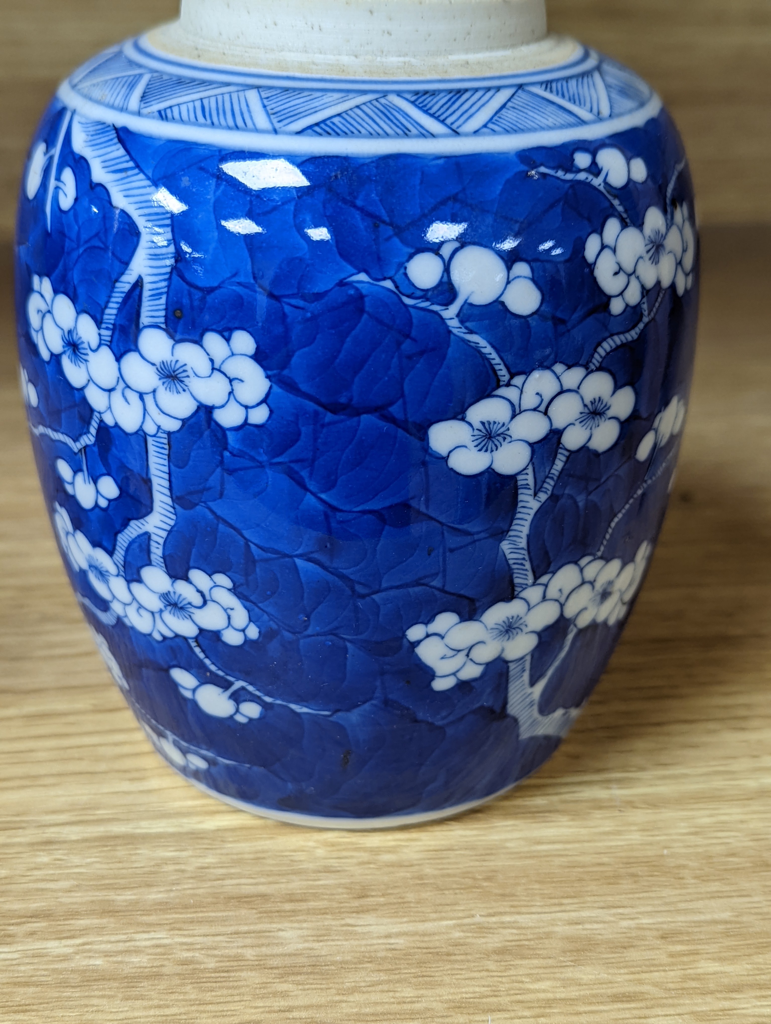 A 19th century Chinese blue and white prunus jar 13.5cm